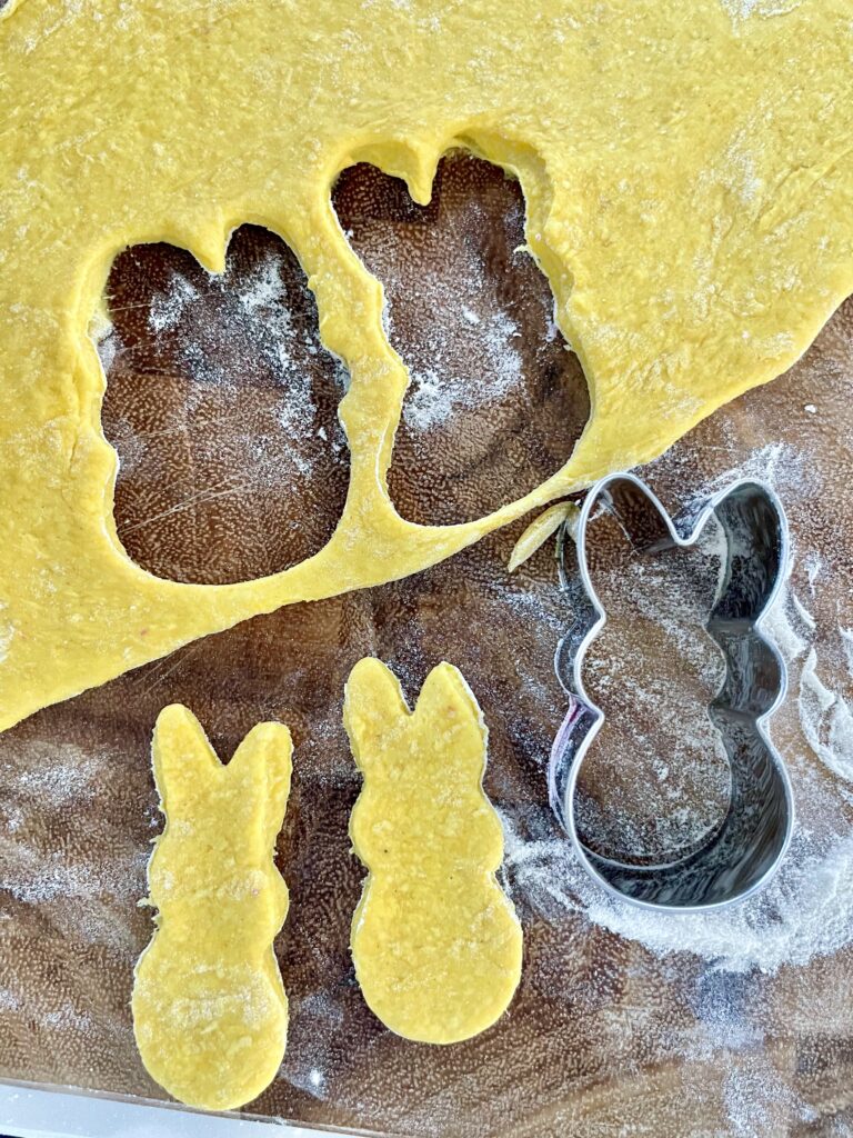 yellow Easter dog treats are cut out of dough