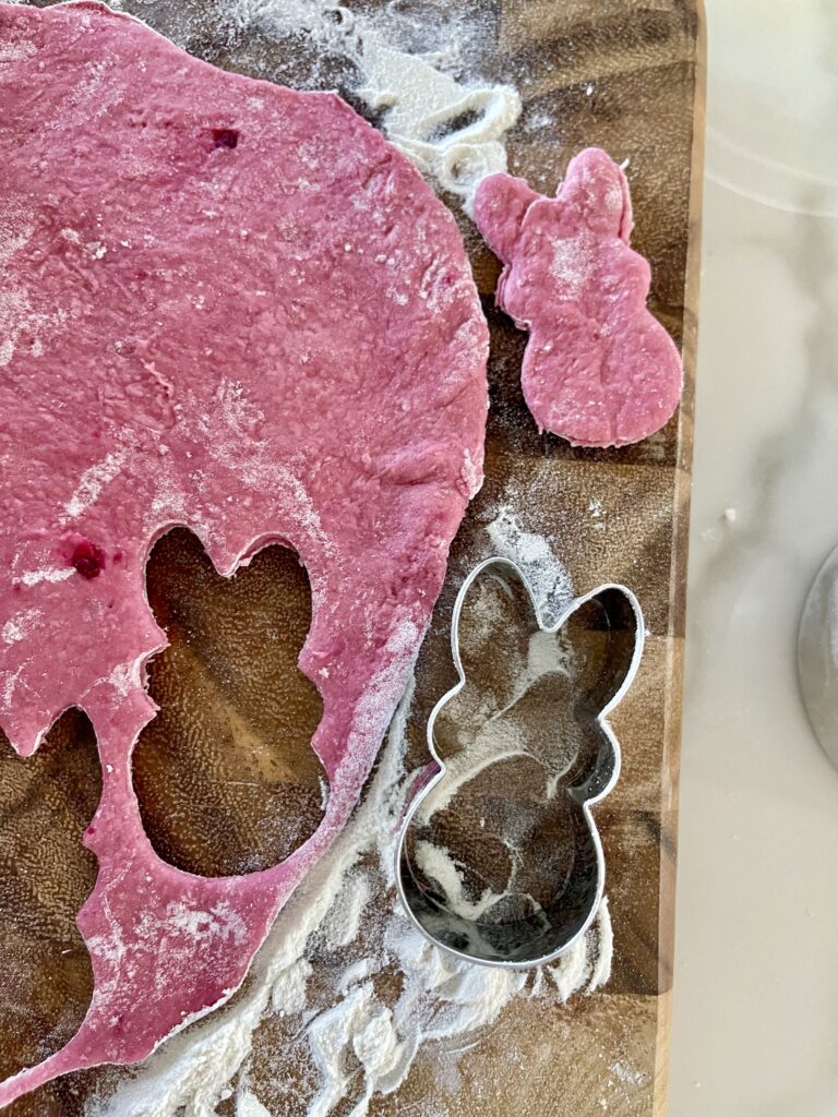 Pink Easter dog treats are cut out of dough