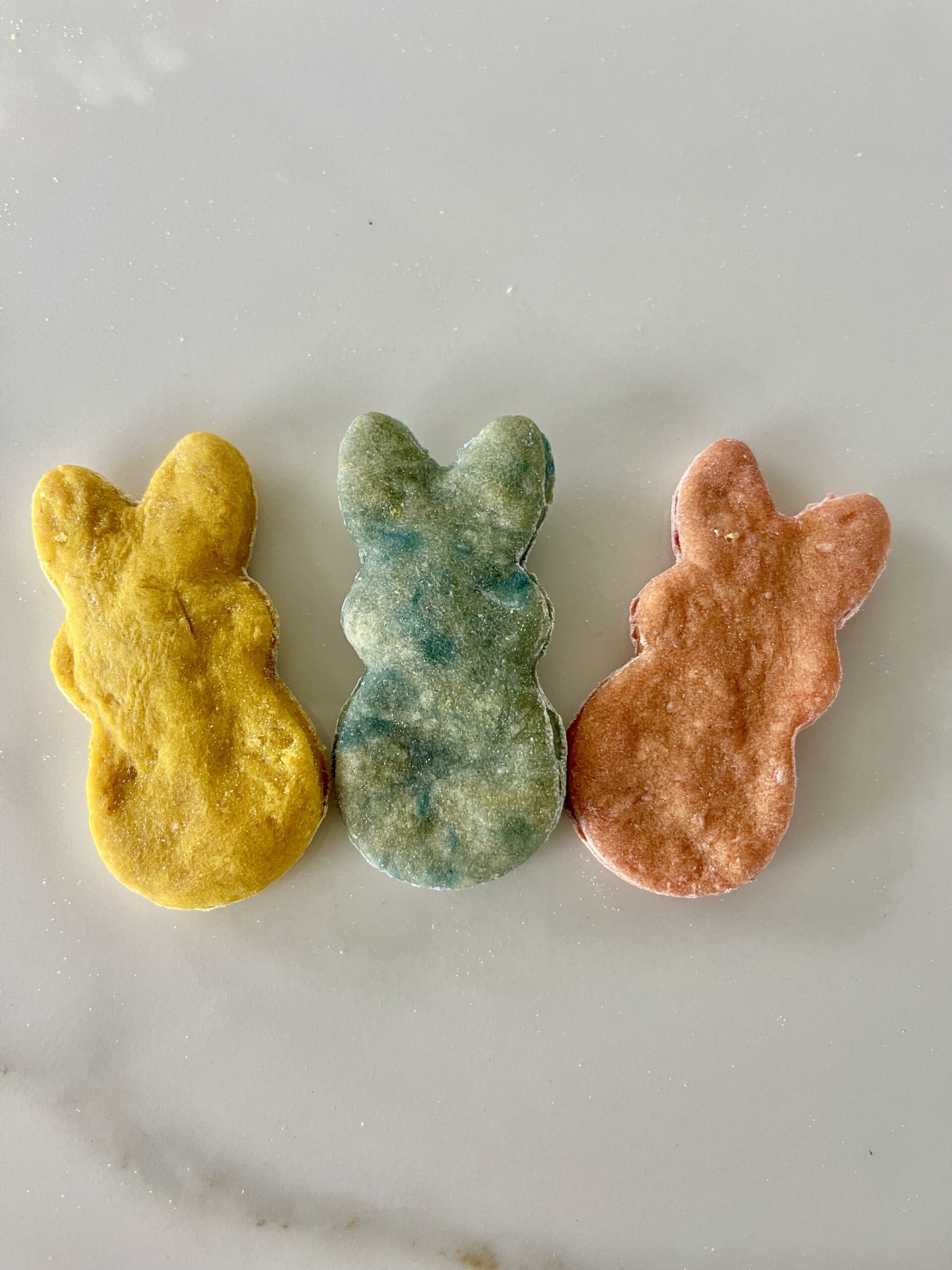 3 peeps easter dog treats lay on the counter
